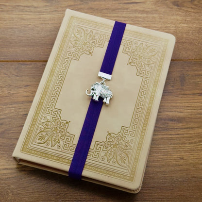 Silver elephant charm on a elastic Bookband